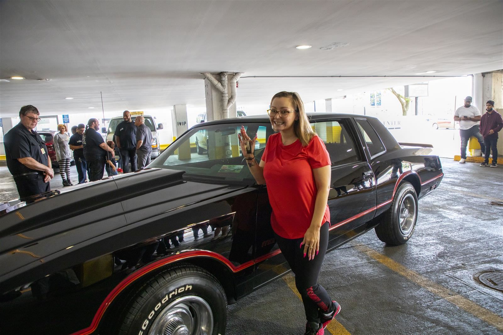  Amanda Berry standing next to her grandfather's car 